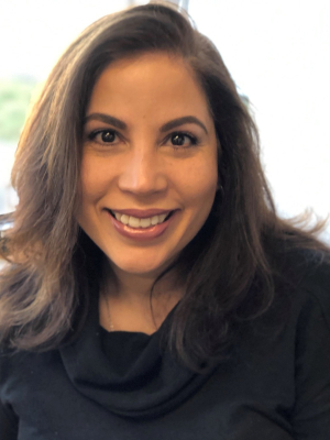 A professional headshot of Tuck Entrepreneurial Programs alumna Ethel Torres, CEO of National Drug Source. Ethel attended the Building a Successful Business program in 2019.